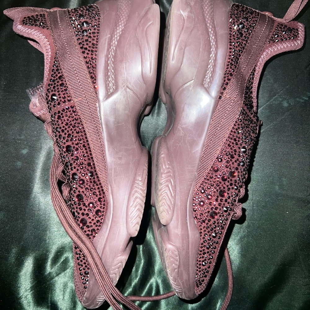 Burgundy Steve Madden sneakers.